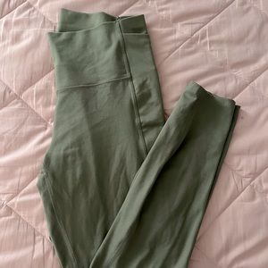Target All in Motion leggings with side pockets. Women’s size large, olive green